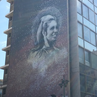 A famous mural of the Lebanese pop star Sabah. She is depicted without a headscarf, and that's something.