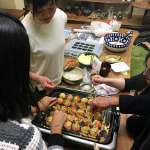 Making takoyaki. We sucked at it.